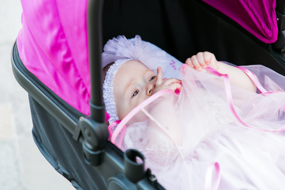 copil carucior botez