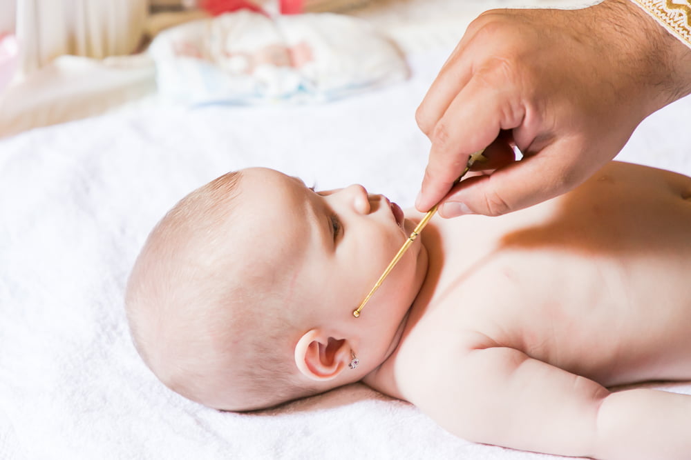 Botez biserica, Emilia 11 Sfintire la botez