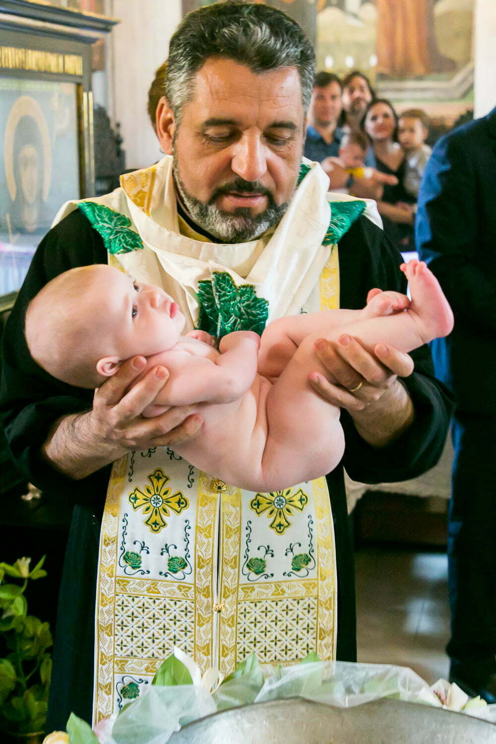 Botez biserica, Emilia 12 Imbaierea copilului